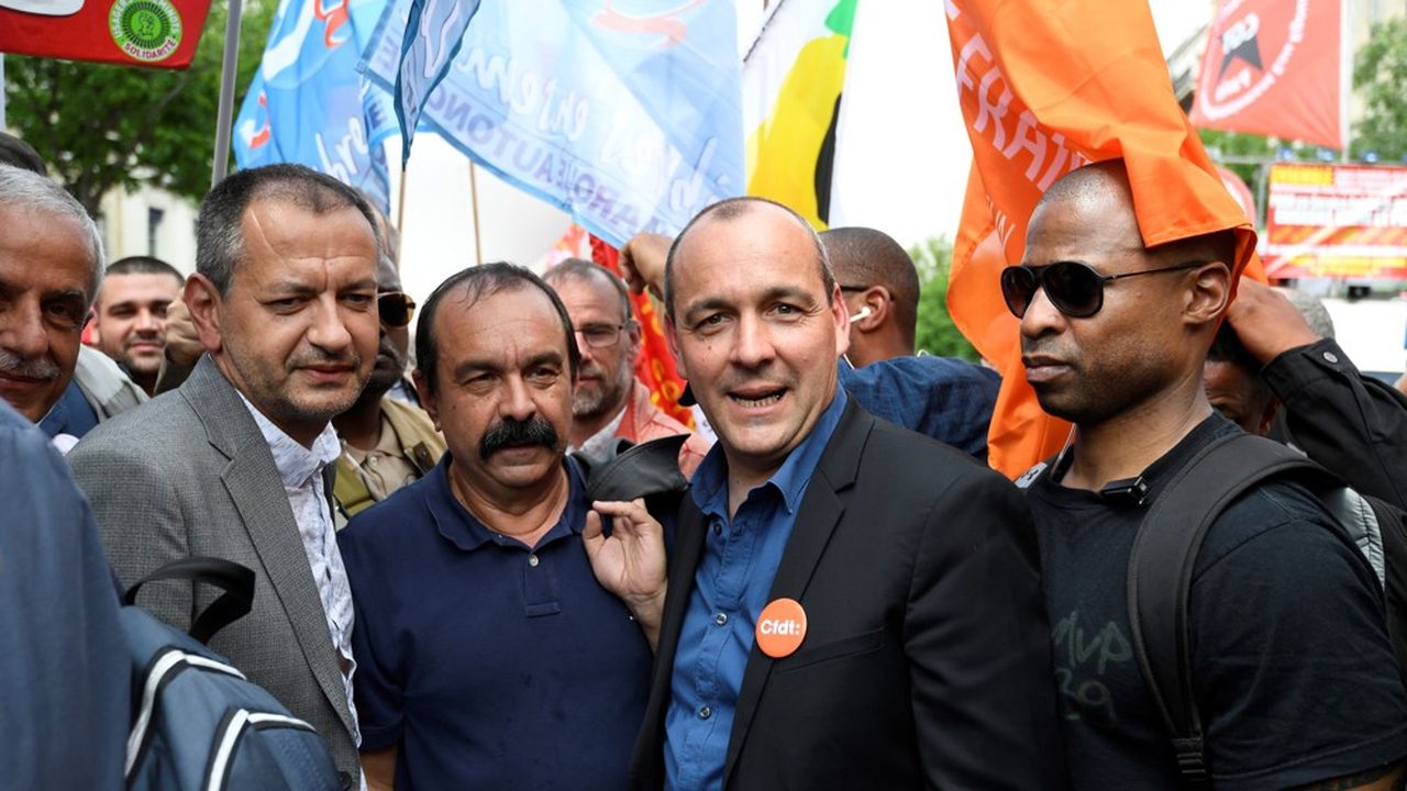 Pascal Pavageau, le nouveau secrétaire général de FO, Philippe Martinez, le leader de la CGT et Laurent Berger, celui de la CFDT, lors de la manifestation des fonctionnaires à Paris ce mardi.