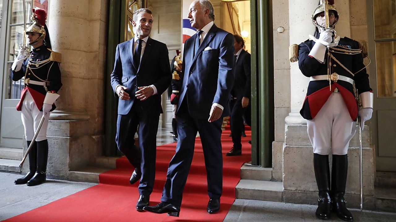 Emmanuel Macron et Laurent Fabius, le président du Conseil constitutionnel.