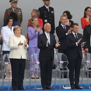 Le président de la République était entouré de nombreux invités européens, dont la chancelière allemande Angela Merkel et le premier ministre néerlandais Mark Rutte (à gauche), pour ce 14-Juillet placé sous le signe de l'Europe de la défense.