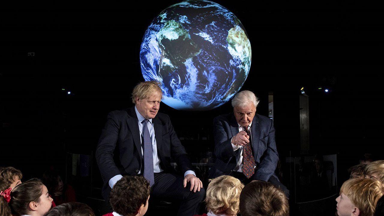Le Premier ministre britannique Boris Johnson et David Attenborough lors du lancement officiel de la COP26 en février à Londres.
