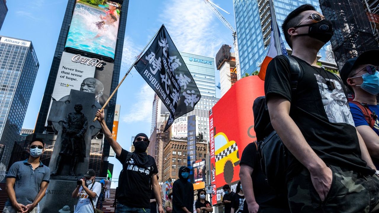 Des manifestants à New York soutiennent le mouvement pro démocratie à Hong Kong.