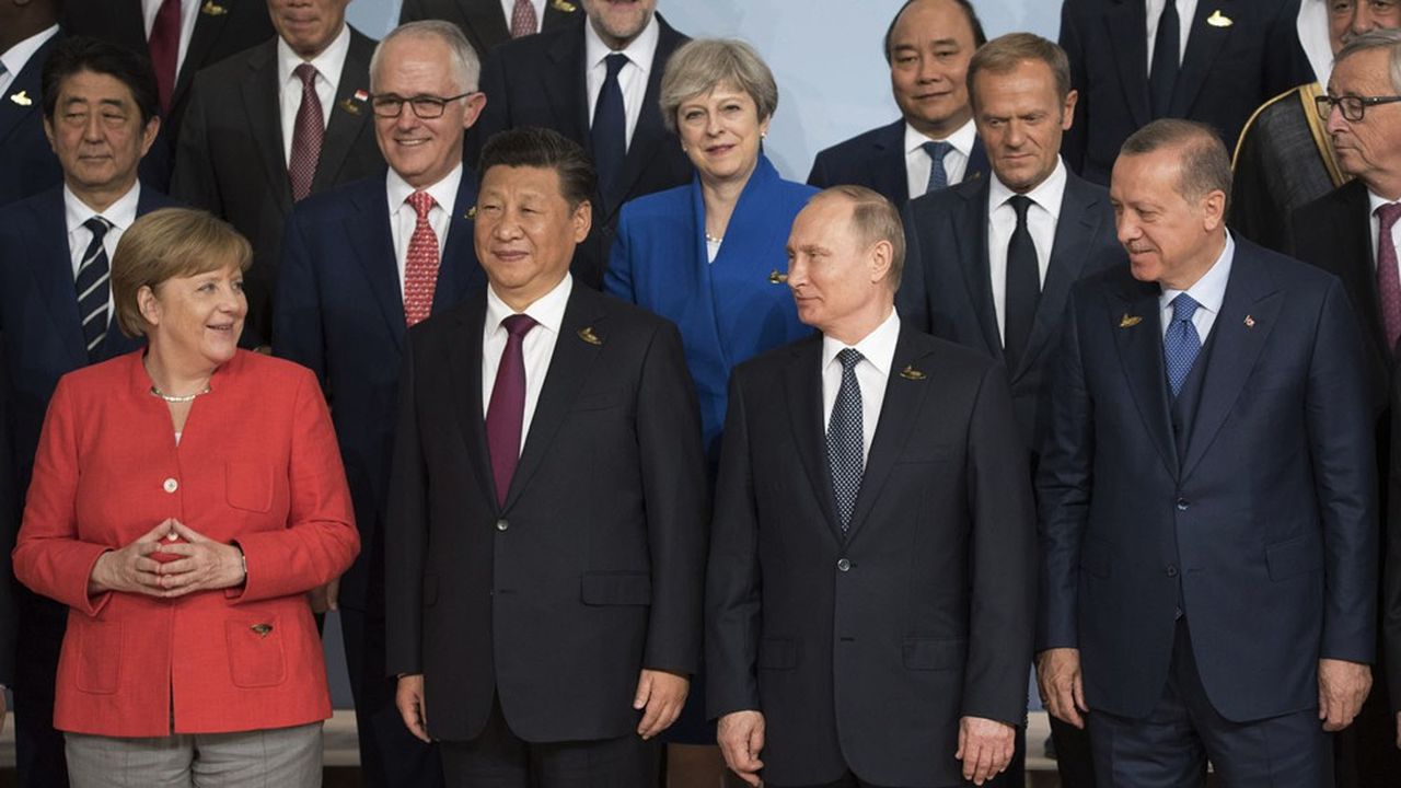 Xi Jinping, Poutine et Erdogan au G20 à Hamburg, le 7 juillet 2017, au côté d'Angela Merkel.