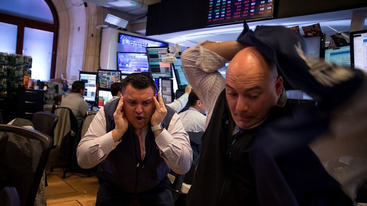 Traders sur le parquet du New York Stock Exchange (NYSE), le 12 mars 2020.