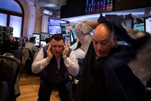 Traders sur le parquet du New York Stock Exchange (NYSE), le 12 mars 2020.