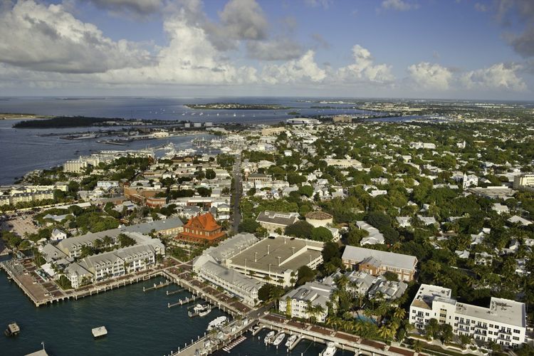 Florida's Key West City, its colorful home and its harbor.