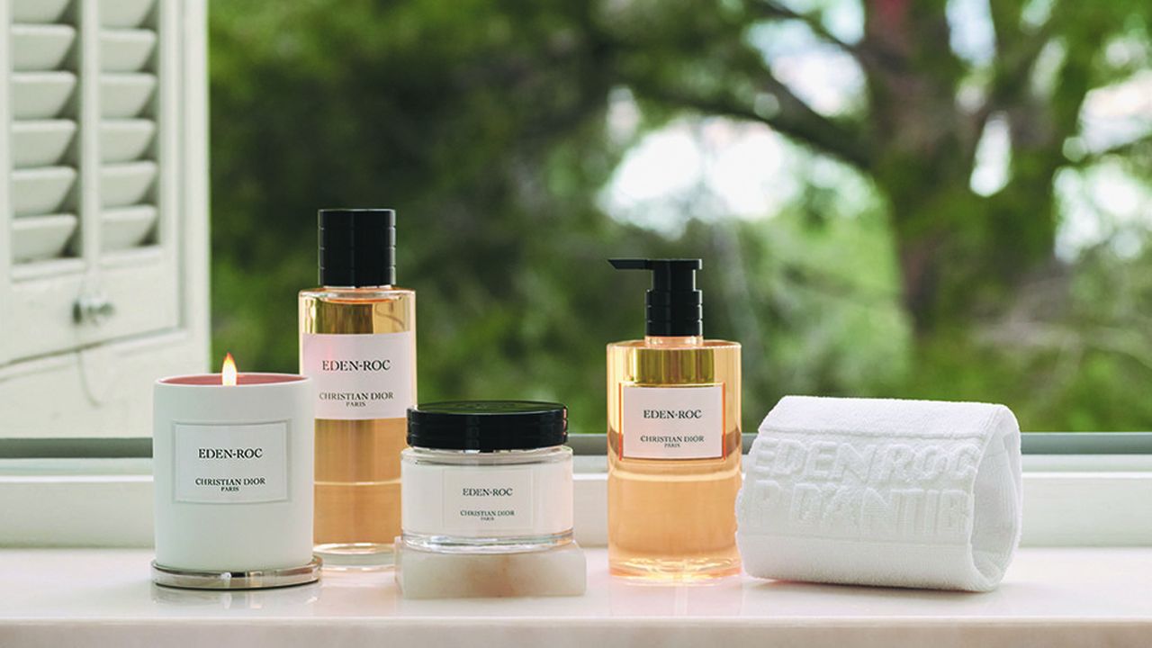 Le parfum, la bougie, le savon liquide et la crème pour le corps Eden-Roc par Dior.