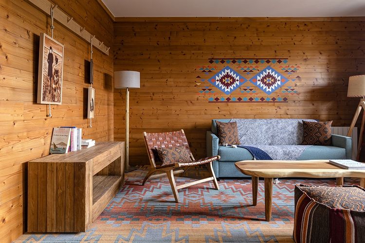 Les chambres sont décorés dans un style montagnard, des Alpes à la Cordillère des Andes.