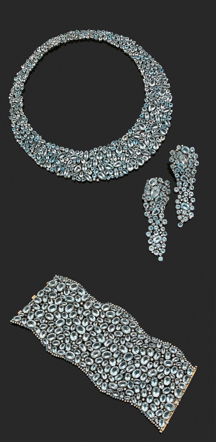 Parure composée d'un collier, d'un bracelet et d'une paire de pendants d'oreilles en or jaune et or gris 18 carats orné d'aigues-marines, diamants et diamants jaunes, Chopard.