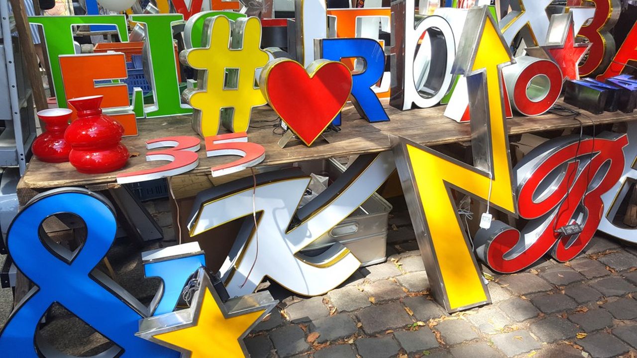 Colorful neon signs for sale in a flea market