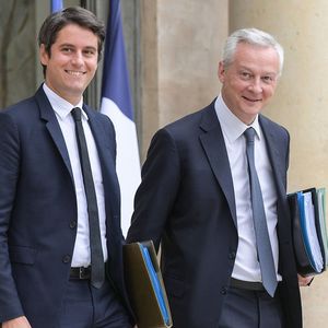Gabriel Attal et Bruno Le Maire au palais de l'Elysée, le 13 juillet 2023, à Paris.